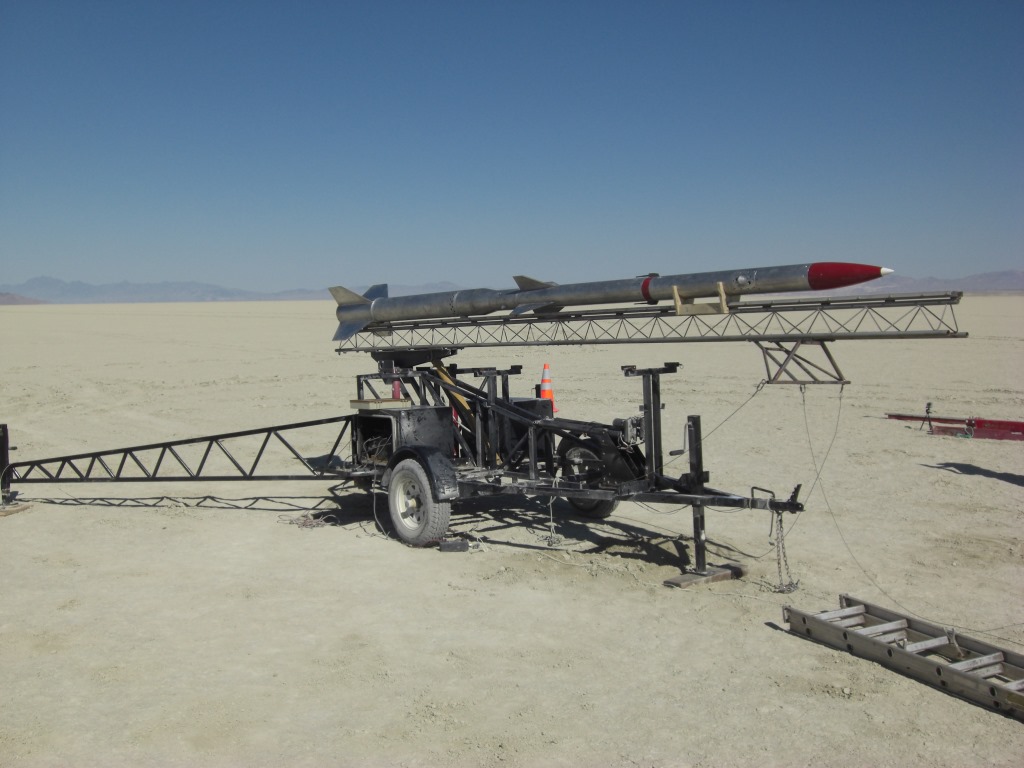Large solid rocket motor blasting away on a rocket test stand